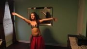 Beautiful Girl Dancing Belly Dance In Front Of Mirror